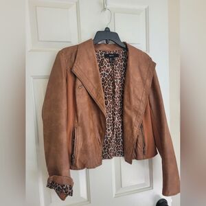 Junior Faux leather jacket. Loved but still has life left. Sfh. Dog friendly.